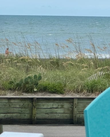 White curved balcony overlooking the Atlantic Ocean